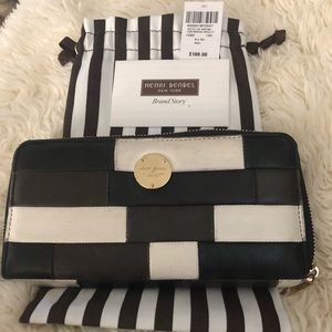 Henri Bendel wallet 712 wallet and it’s lamb skin